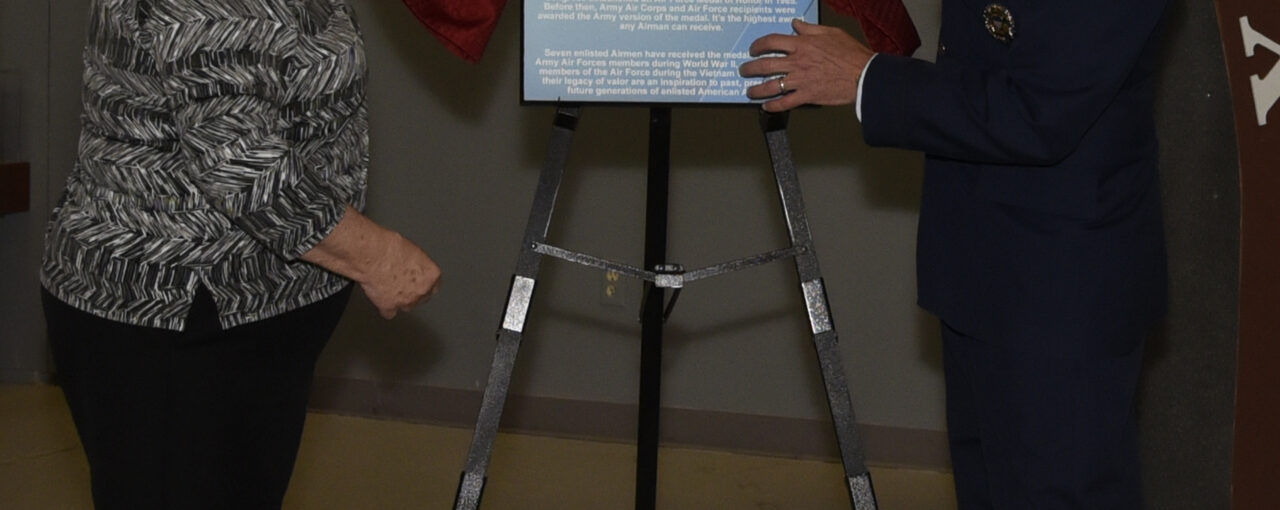 PETERSON AIR FORCE BASE, Colo. – Terry Chapman (left), mother of Master Sgt. John Chapman, and Col. Todd Moore (right), 21st Space Wing commander, unveil the Medal of Honor recipient plaque at the Peterson Air and Space Museum on May 20, 2019. Sergeant Chapman was posthumously awarded the Congressional Medal of Honor for his actions in the Battle of Takur Ghar. (U.S. Air Force photo by Staff Sgt. Alexandra M. Longfellow)